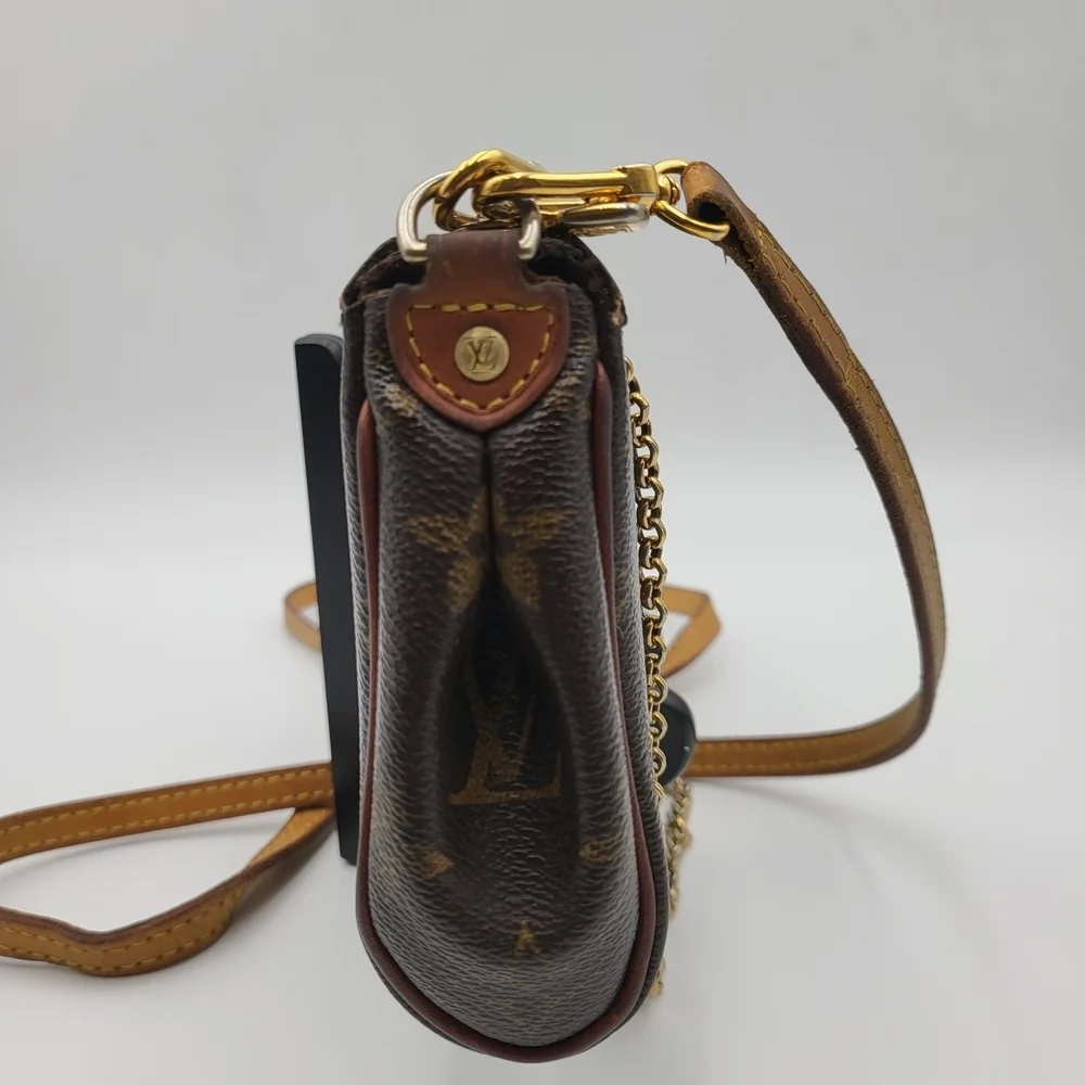 LOUIS VUITTON Eva Monogram Leather Pochette Bag..Authentic..
